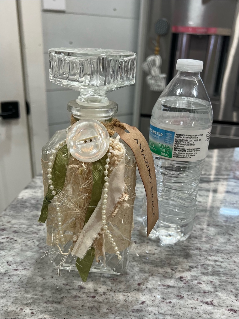 Decorative Glass Decanter with Cream and Green Tassel Accents